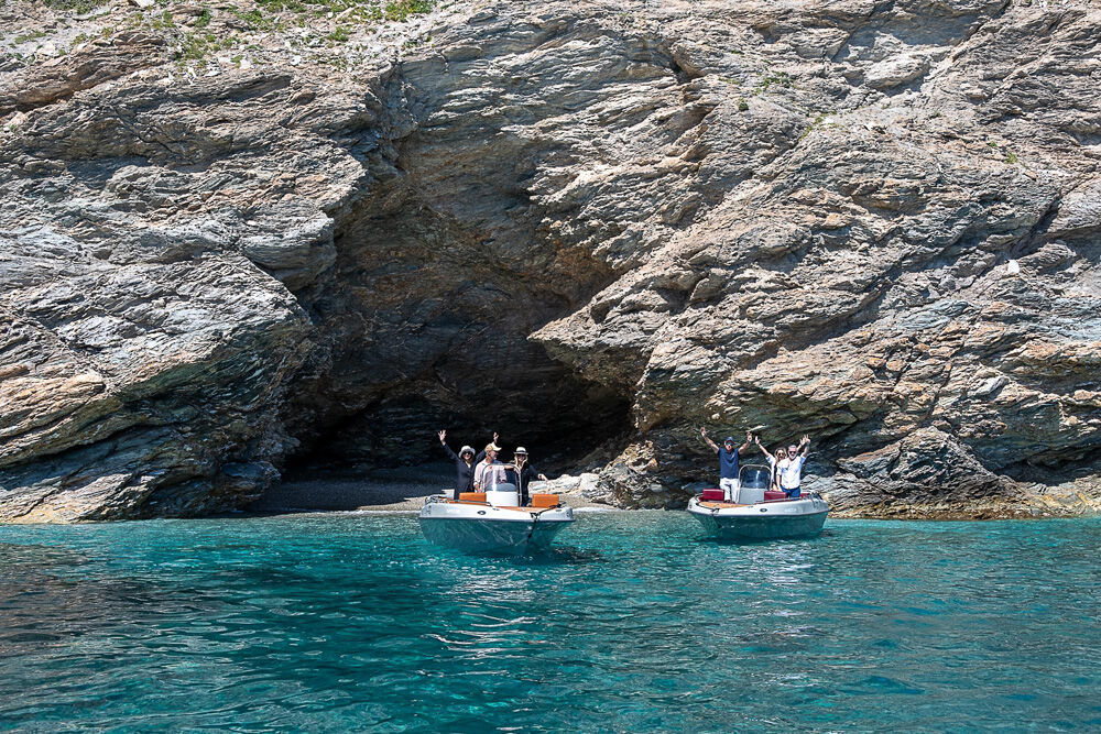 Speedboats at a sea cave entrance